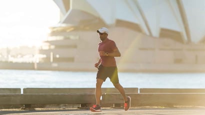 Man running next to the Sydney Opera House